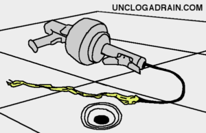 Unclog basement floor drain - pull clog out